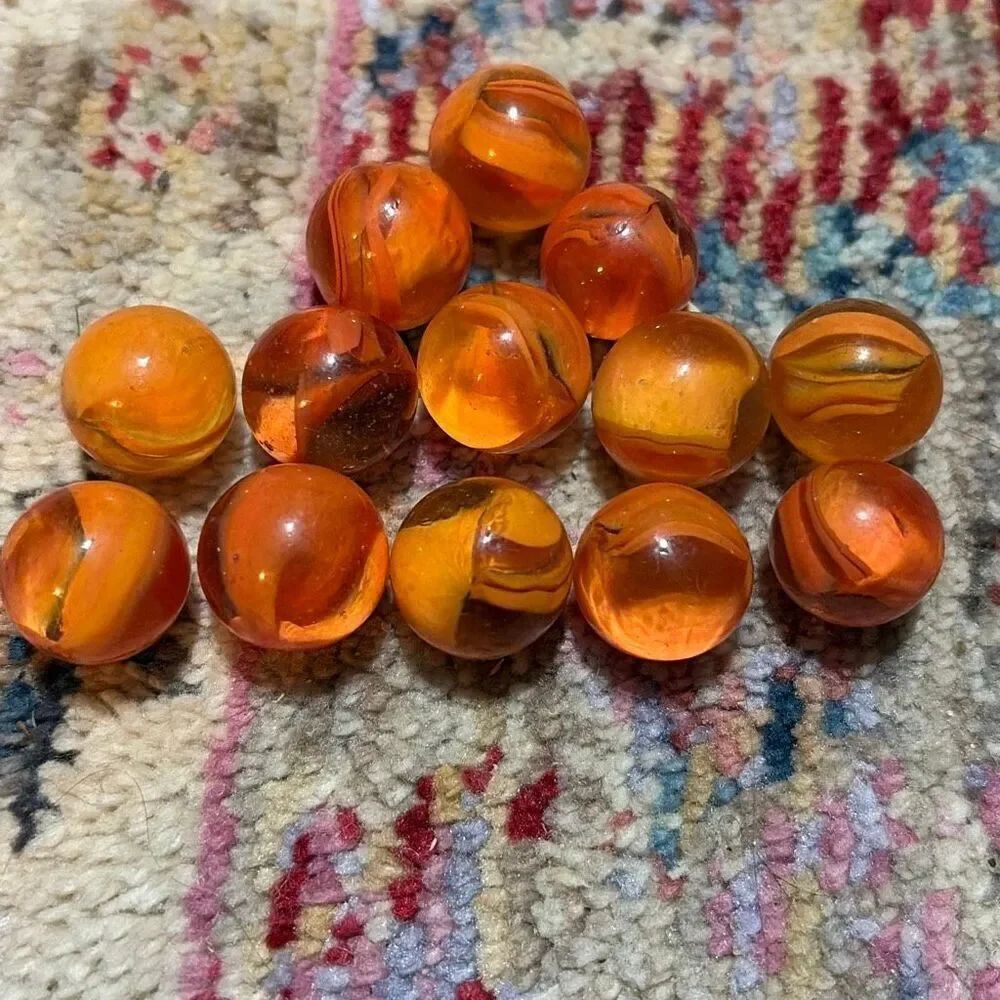 Vintage hard to find pumpkin edge, cats eye marbles 13 each